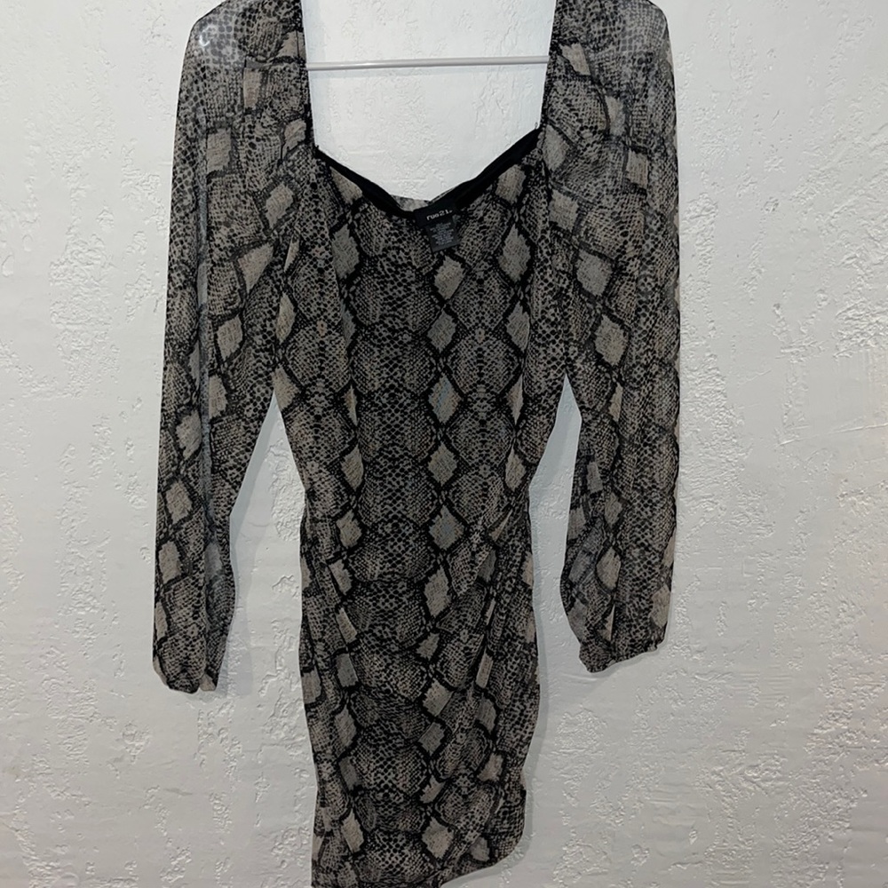 Snake bodycon mini dress. Gray, black, and cream color.
